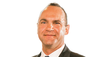 Headshot of John Howell